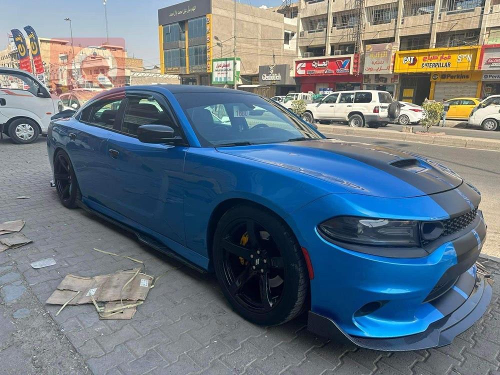دۆج چارجەر